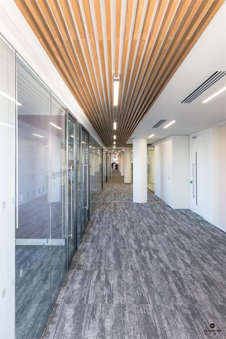 4 - A single corridor links the two ends of the workspace - the open plan and dining + breakout areas.jpg